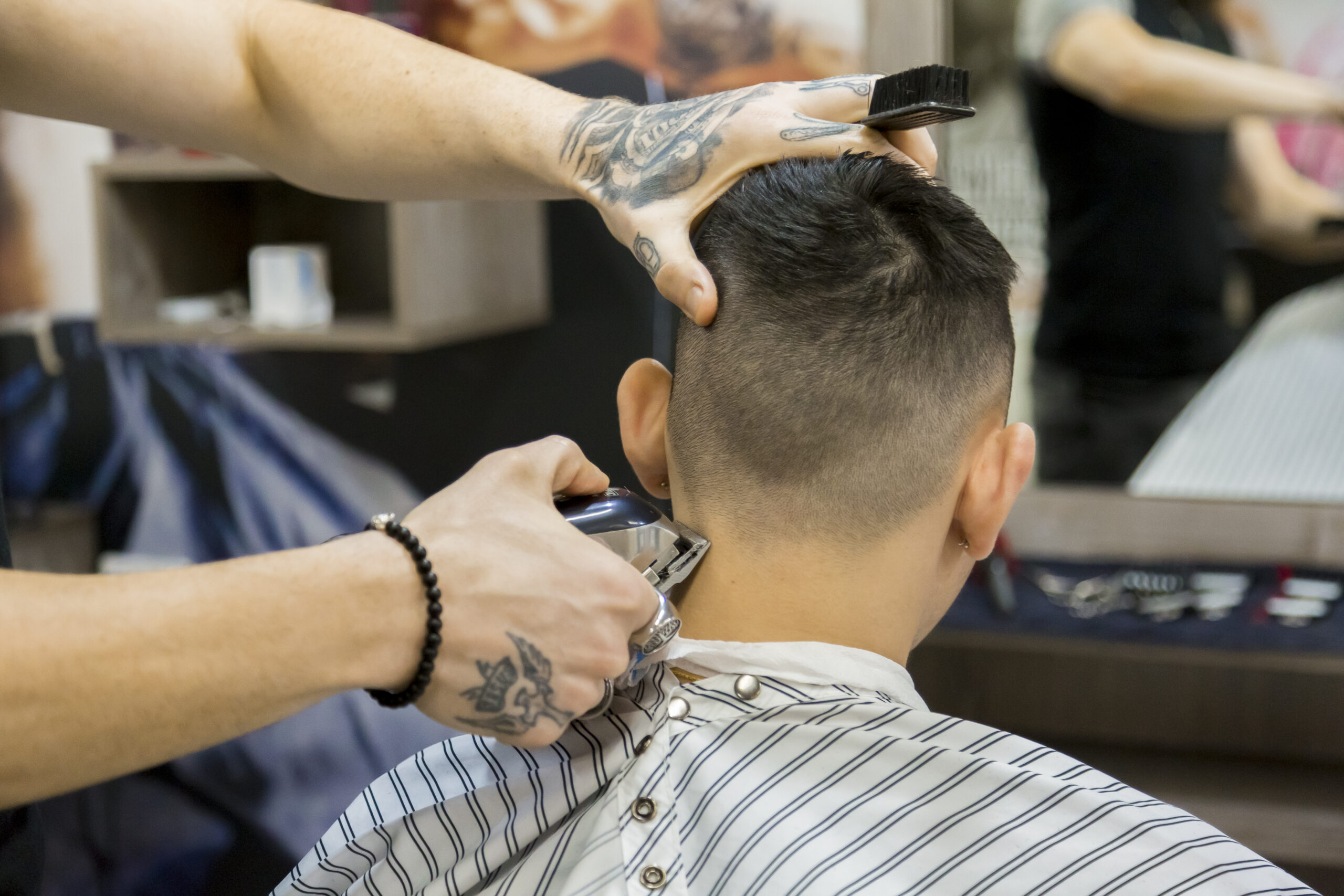 image of Barber doing a haircut at Casual cuts Wallan